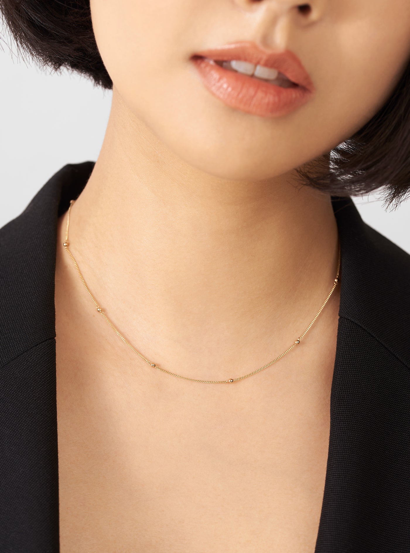 14k gold dainty choker necklace. perfect for layering. luxury gold necklace.